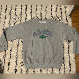 Grey Pacific Sunwear crewneck.